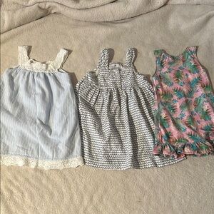 Set of Three Girls' Dresses in Blue, Black, and Pink